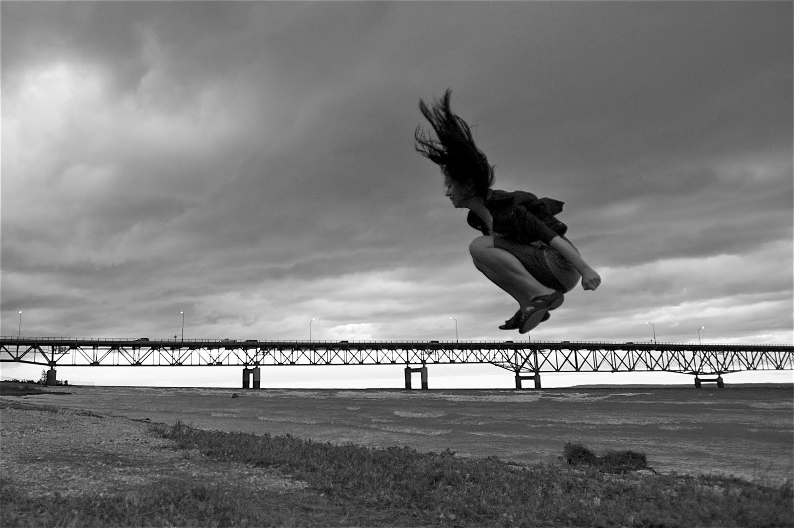 Yumiko Jumping Over the Mackinac Bridge